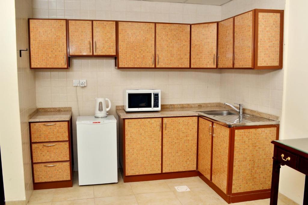 Sara Hotel Apartments Ajman Quarto foto