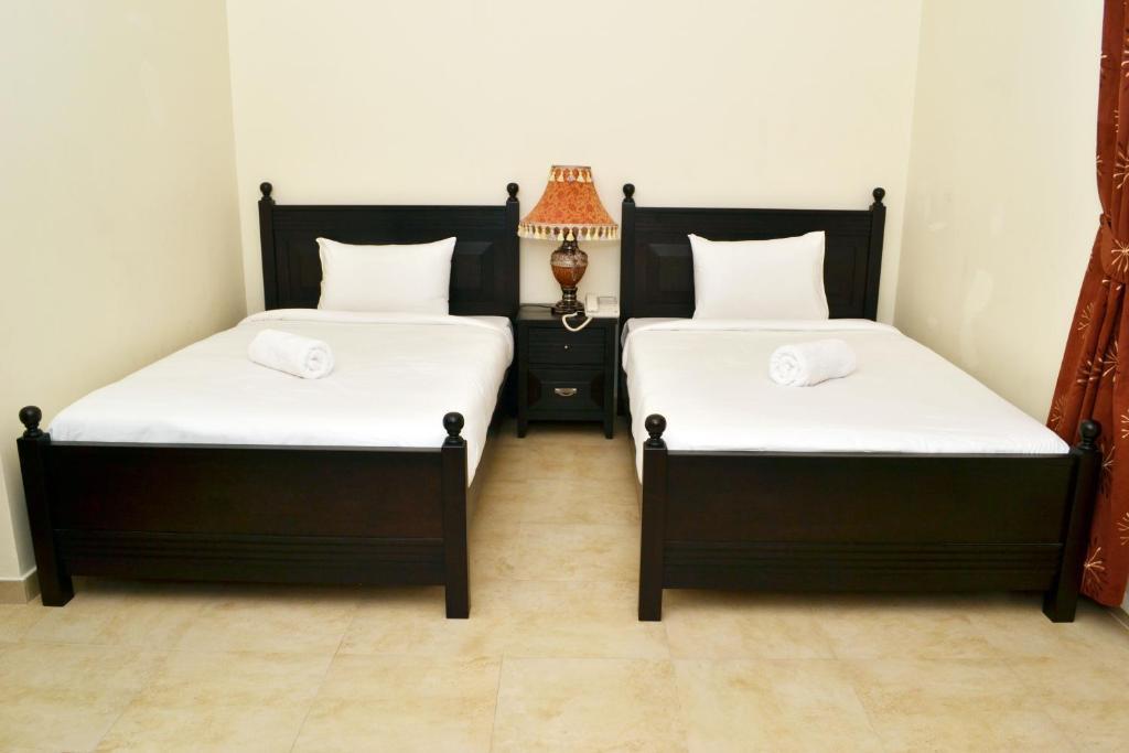 Sara Hotel Apartments Ajman Quarto foto